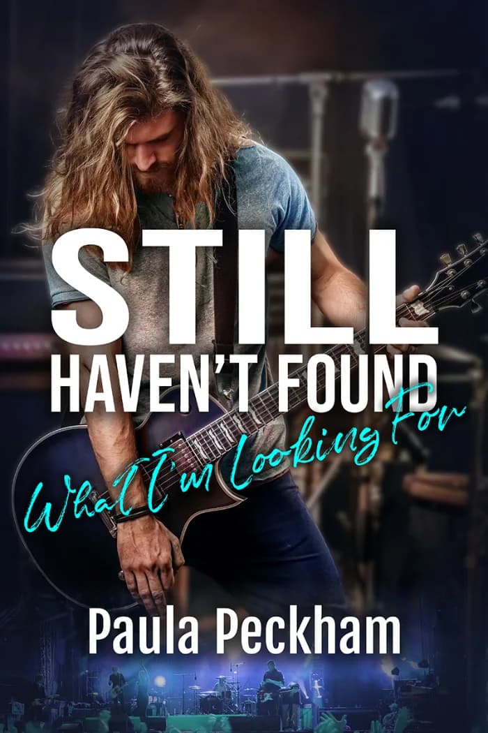 43-year-old man, playing guitar, long hair, rockstar